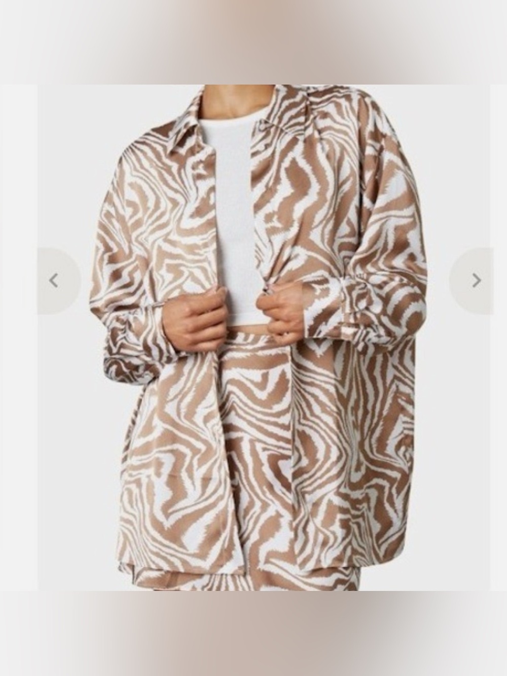 NIA Zebra Print Button Down
Shirt
Long Sleeve Oversized Copper
White Medium S